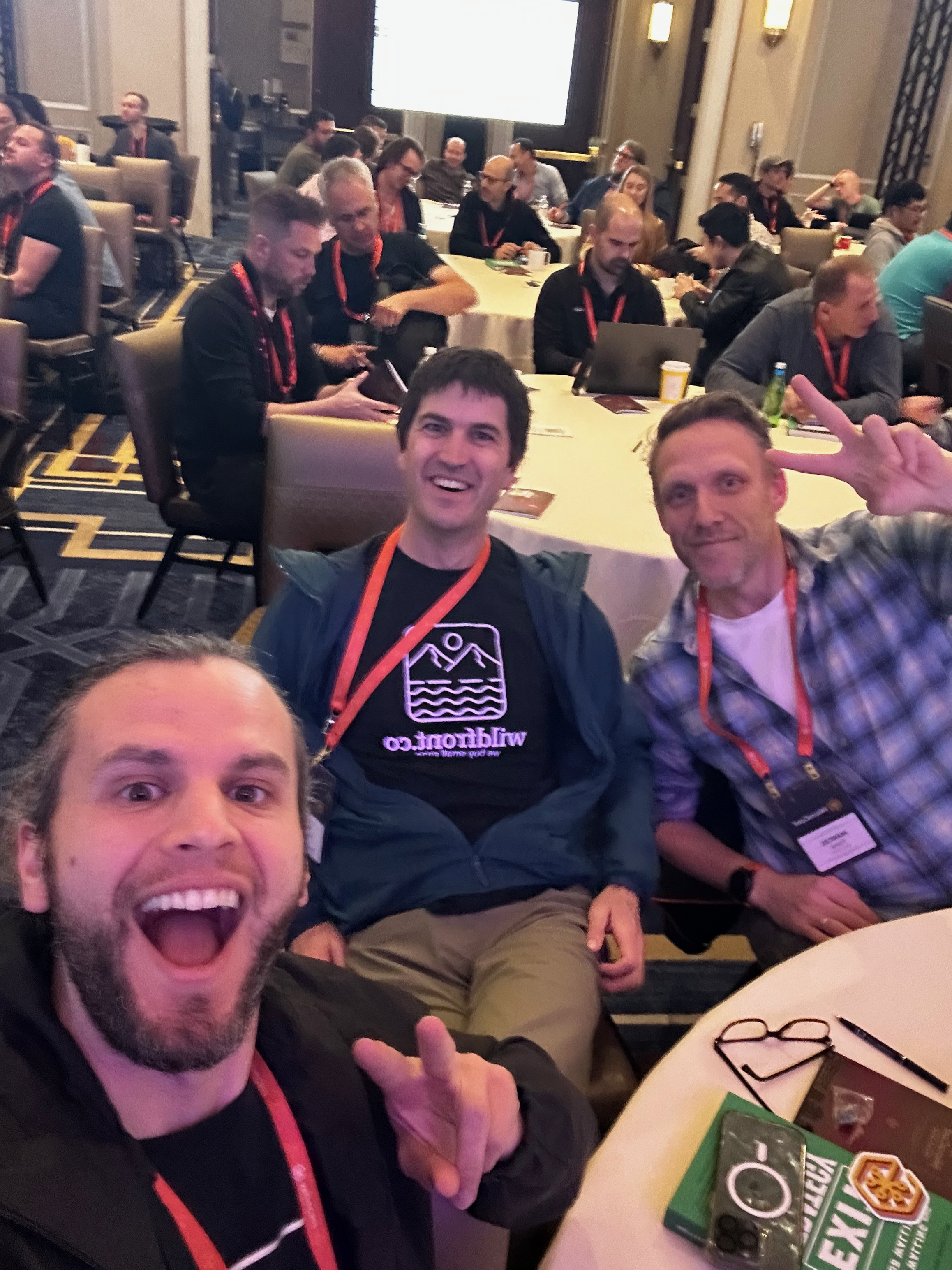 Attendees networking at MicroConf conference